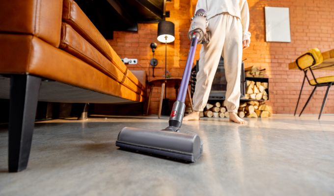 hoovering floor with cordless stick vacuum